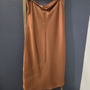 Orange satin midi length skirt size M/L